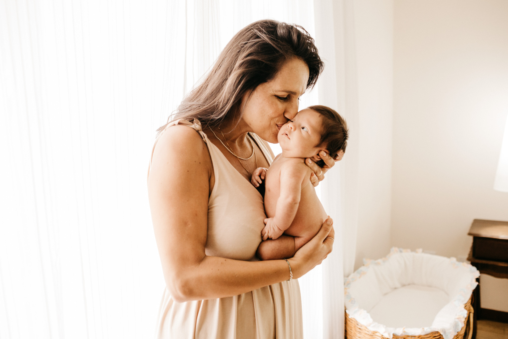 Mother Kissing Her Cute Baby