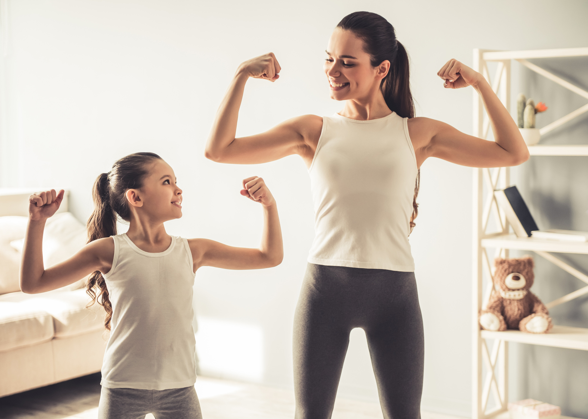 Mom and daughter working out